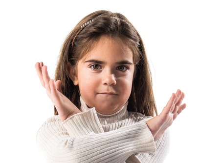 Little brunette girl making NO gestureの写真素材