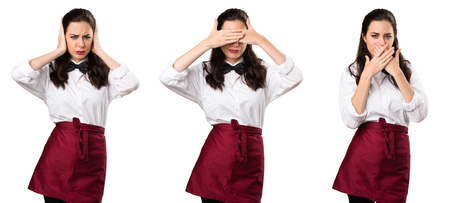 Set of Young beautiful waitress covering her eyes, ears and mouthの写真素材