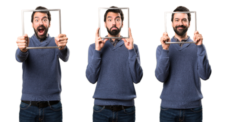 Set of Sad Handsome brunette man with beard with frameworkの写真素材