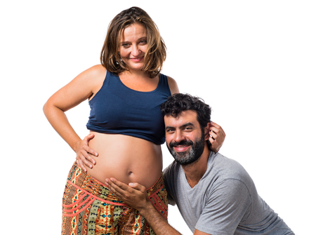 Father and pregnant mother togetherの写真素材