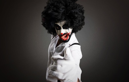 Killer clown shouting on textured backgroundの写真素材