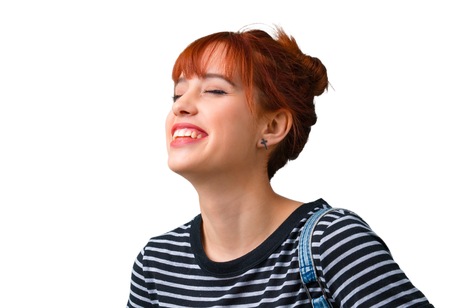 Young student redhead girl laughingの写真素材