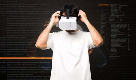 Man using VR glasses inside the virtual reality modeの写真素材