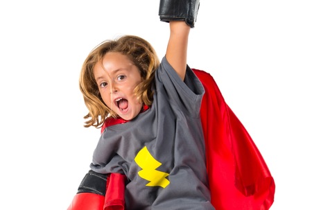 Little blonde girl dressed like superheroの写真素材