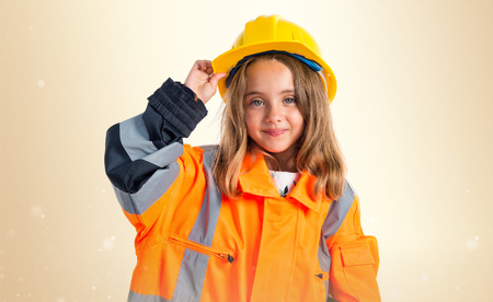 Little blonde girl dressed like labourerの写真素材