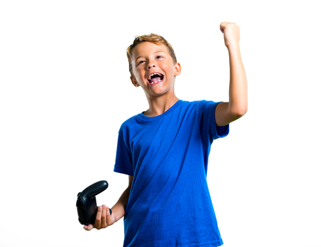 A full-length shot of Lucky kid playing the console on isolated white background