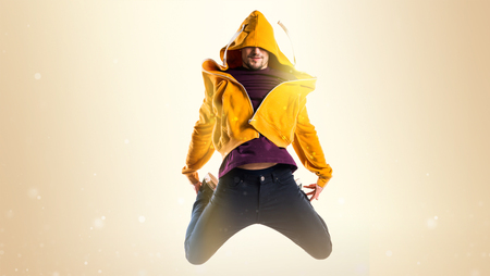 Dancer man on ocher backgroundの写真素材