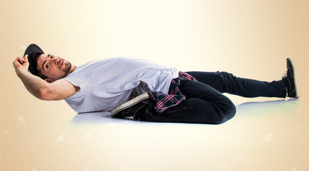 Dancer man on ocher backgroundの写真素材