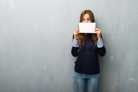 Telemarketer woman holding a placard for insert a conceptの写真素材