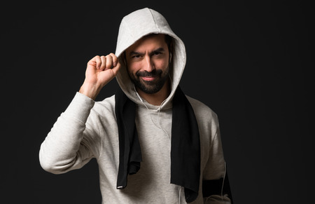 Sport man over dark backgroundの写真素材