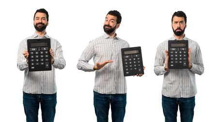 Collage of Handsome man with beard holding a calculatorの写真素材