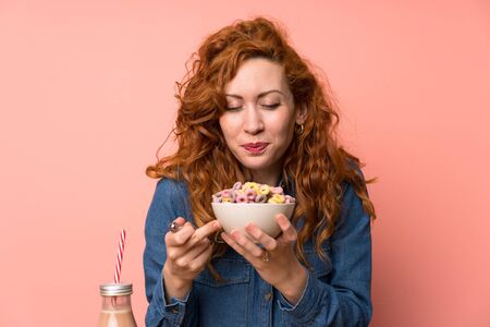 Redhead woman having breakfast