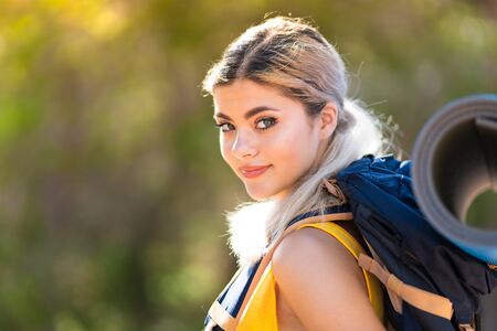 Teenager girl hiking at outdoorsの写真素材