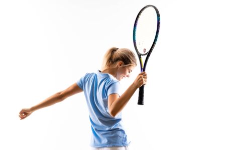 Teenager tennis player girl over isolated white backgroundの写真素材