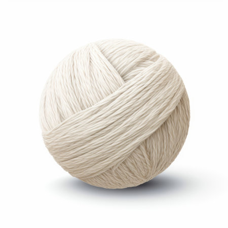 A ball of white yarn on a white backgroundの素材