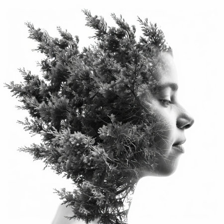 A captivating black and white photo of a woman's face with a tree, showcasing the stunning beauty of nature and humanity in one frame.の素材