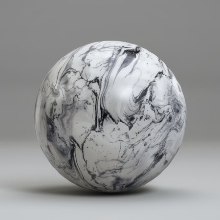 A black and white marble ball is positioned on top of a wooden table, with a smooth and glossy surface. The ball stands out starkly against the neutral background of the table, showcasing its unique pattern and texture.の素材