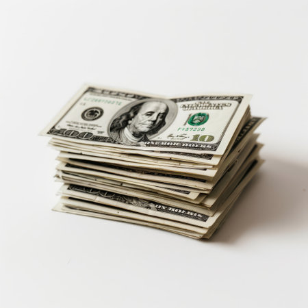 A stack of twenty dollar bills neatly arranged on top of each other, showcasing wealth and financial value. The bills are crisp and new, forming a solid structure of currency.の素材