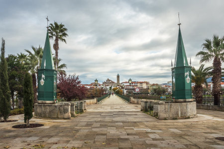 View of the entrance to the medieval bridge of Mirandela in Portugal, with two niches dedicated to Nossa Senhora do Amparo and Senhor dos Aflitos.の写真素材