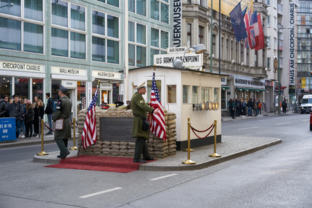 Checkpoint Charlie in Berlin with soldiers in uniformのeditorial素材