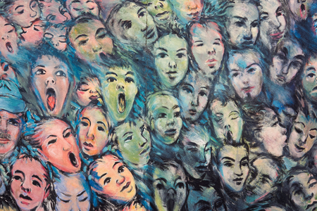 Wall paint of faces at the Eastside gallery in Berlinのeditorial素材