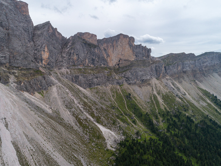 Aerial Drone photo of Santa Magdalena St Maddalena Val di Funes in Dolomites Italian Alps with Furchetta mountain peak on the backgroundの写真素材