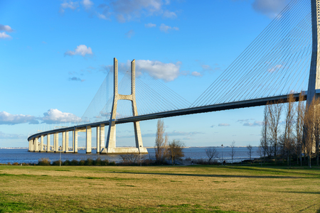 Ponte Vasco da Gama Bridge view from a garden park during the dayの写真素材