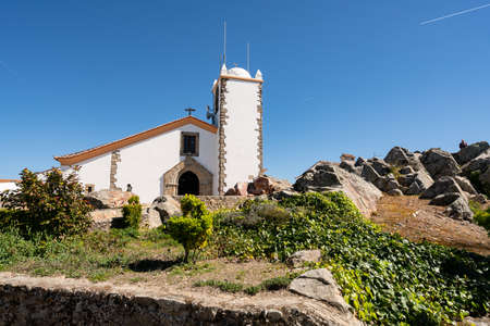 Espirito Santo church in Marvao on the middle of a beautiful landscape and city wallsの写真素材