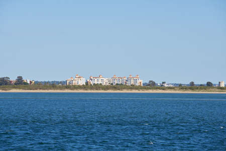 Isla Canela and Ayamonte in Spain view from Vila Real de Santo Antonio in Portugal with Guadiana riverの写真素材