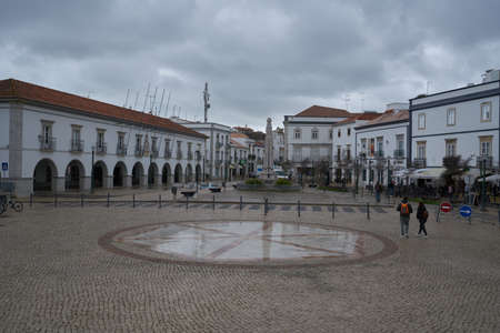 People passing on a street in Tavira, Algarve, in Portugalのeditorial素材