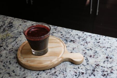 Healthy juice made with beets and other veggiesの写真素材