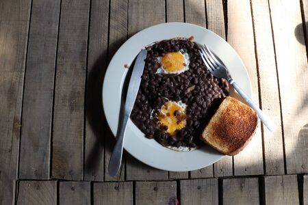 Huevos con frijoles traditional mexican breakfastの写真素材