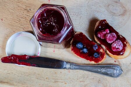 Homemade berries jam and toast top viewの写真素材