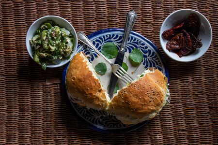 Top view of cemita poblana traditional mexican cuisine served on talavera plateの写真素材