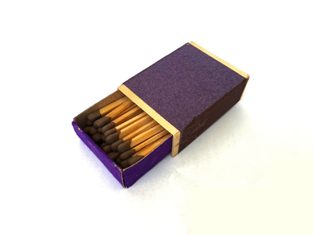 A box with matchsticks on white backgroundの写真素材