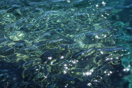 Abstract shallow seawater sun reflectionsの写真素材