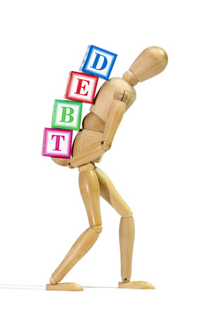 Mannequin loaded with debt as a concept of 'debt burden'の写真素材