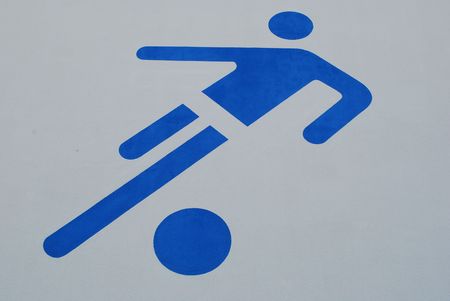 painted wall with a soccer pictureの写真素材