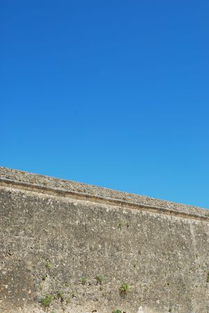 ancient stonewall architecture with sky backgroundの写真素材