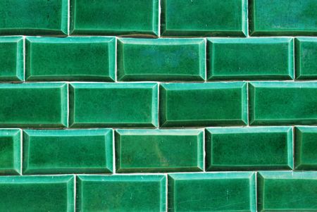 building wall made of green mosaics の写真素材