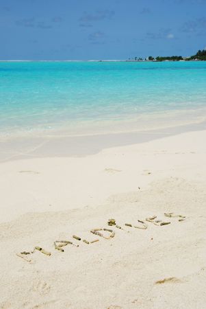 Maldives note written on a white sandy beachの写真素材