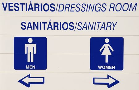 blue and white sanitary and dressing room sign at the poolの写真素材