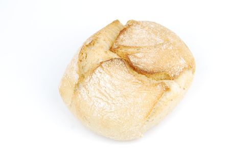 one fresh and baked white wheat bread (isolated on white background)の写真素材