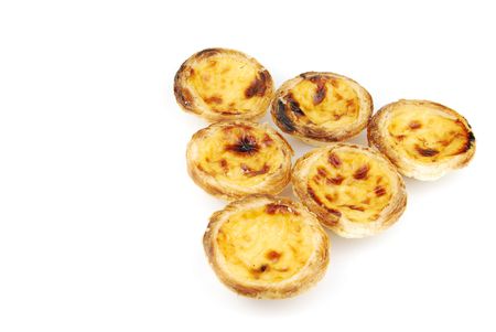 pyramid of delicious pasteis de nata, typical pasty from Lisbon - Portugal (isolated on white...