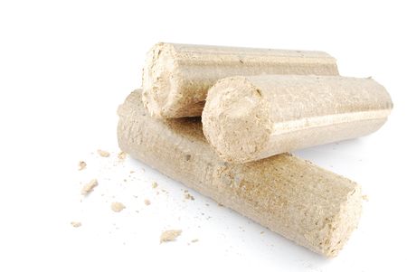briquettes made of sawdust isolated on white backgroundの写真素材