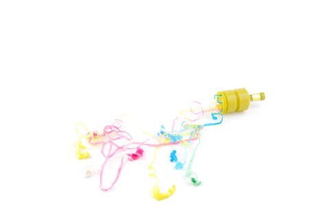 colorful party poppers isolated on white backgroundの写真素材