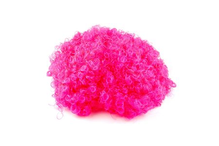 vibrant pink wig isolated on white backgroundの写真素材