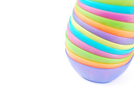 stacked colorful bowls isolated on white backgroundの写真素材
