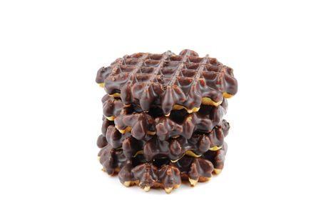 chocolate belgian waffles stacked isolated on white backgroundの写真素材