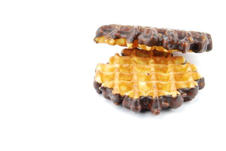 chocolate belgian waffles isolated on white backgroundの写真素材